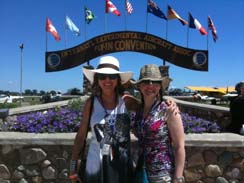 Sonia Greteman and Ashley Bowen Cook standing in the very spot where EAA Chairman Tom Poberezny gave his unexpected, impromptu resignation speech on July 26.