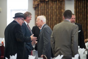 Bruce Whitman mingles with Wichita Aero Club attendees prior to his keynote presentation.