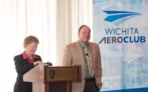 “It’s a wonderful, wonderful thing to be in this sacred place of Wichita, Kansas,” said John King, pictured here with his partner and wife Martha. Together these legendary instructors co-run and co-own the King Schools. And have for more than 40 years. Photo credit: Visual Media Group, photographer Brett Schauf. 