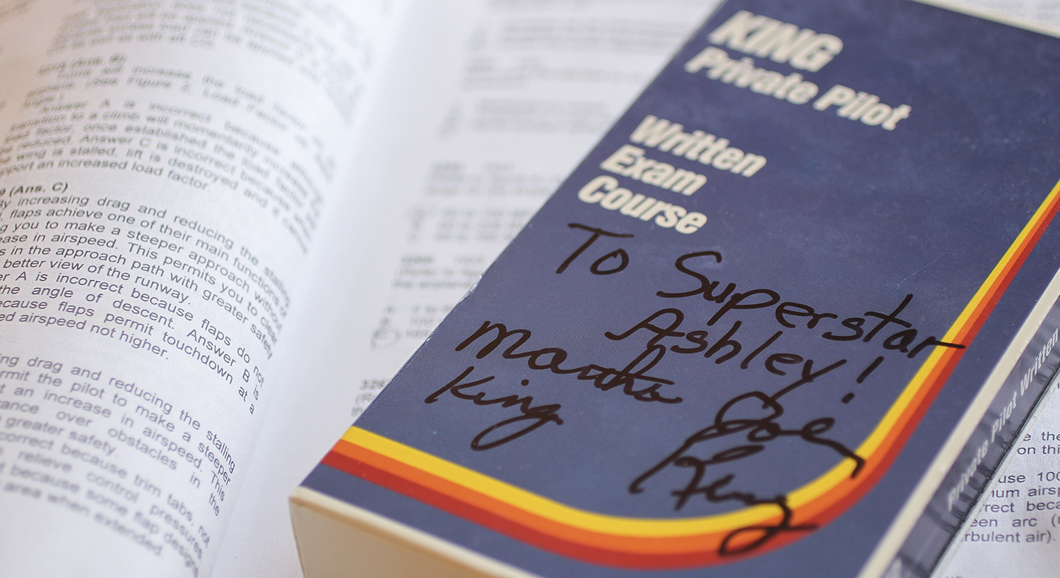 John and Martha signed my 1996-era private-pilot coursebook and VHS tape when they came to Wichita recently. Yes, they taught me to fly just as they have so many others. Nothing like learning from the best. They are the first and only husband and wife to hold every category and class of FAA pilot and instructor certificates.