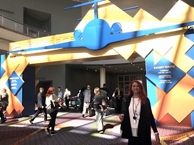 sonia greteman stands in front of nbaa 2018 entrance