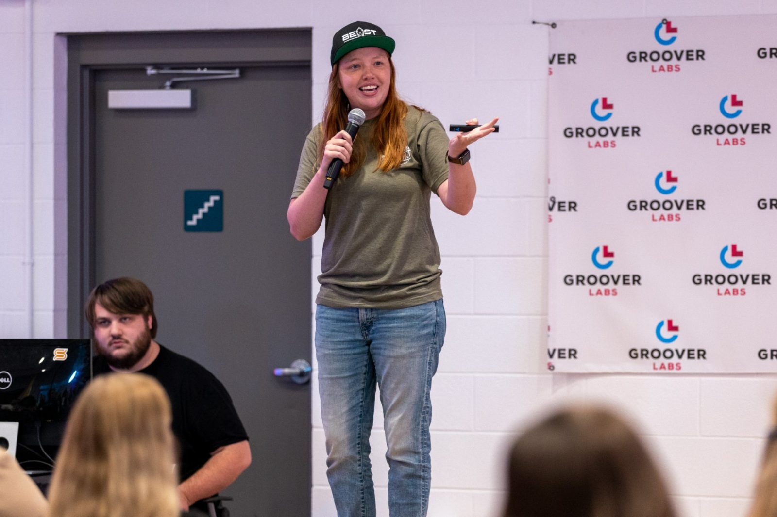 Brie Andersen talks to the crowd about the importance of knowing how to read insights at Social Media Day Wichita.